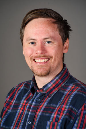 en person med skjegg og bart